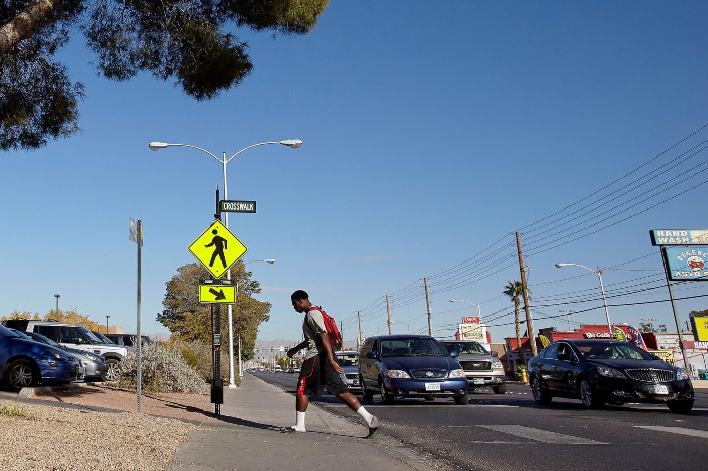 black-youth-walking-across-intersection-1400x933, Walking while Black: The inequitable intersection of racism at the intersection, World News & Views 