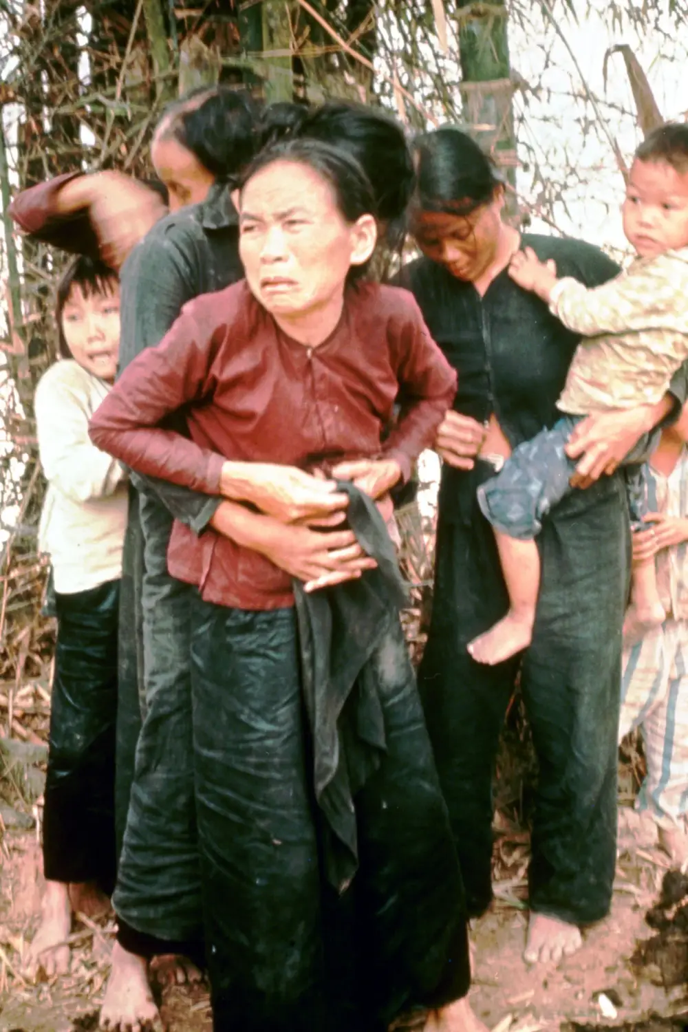 my-lai-villagers-about-to-be-massacred-woman-buttoning-blouse-after-rape-031668, Commemoration of the 50th anniversary of the end of the Vietnam War, World News & Views my-lai-villagers-about-to-be-massacred-woman-buttoning-blouse-after-rape-031668, Commemoration of the 50th anniversary of the end of the Vietnam War, World News & Views