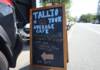 tallios-is-not-your-average-cafe-sandwich-board-sign-in-street-by-ase-mora-100x70, SF Bay View Front Page (New), 