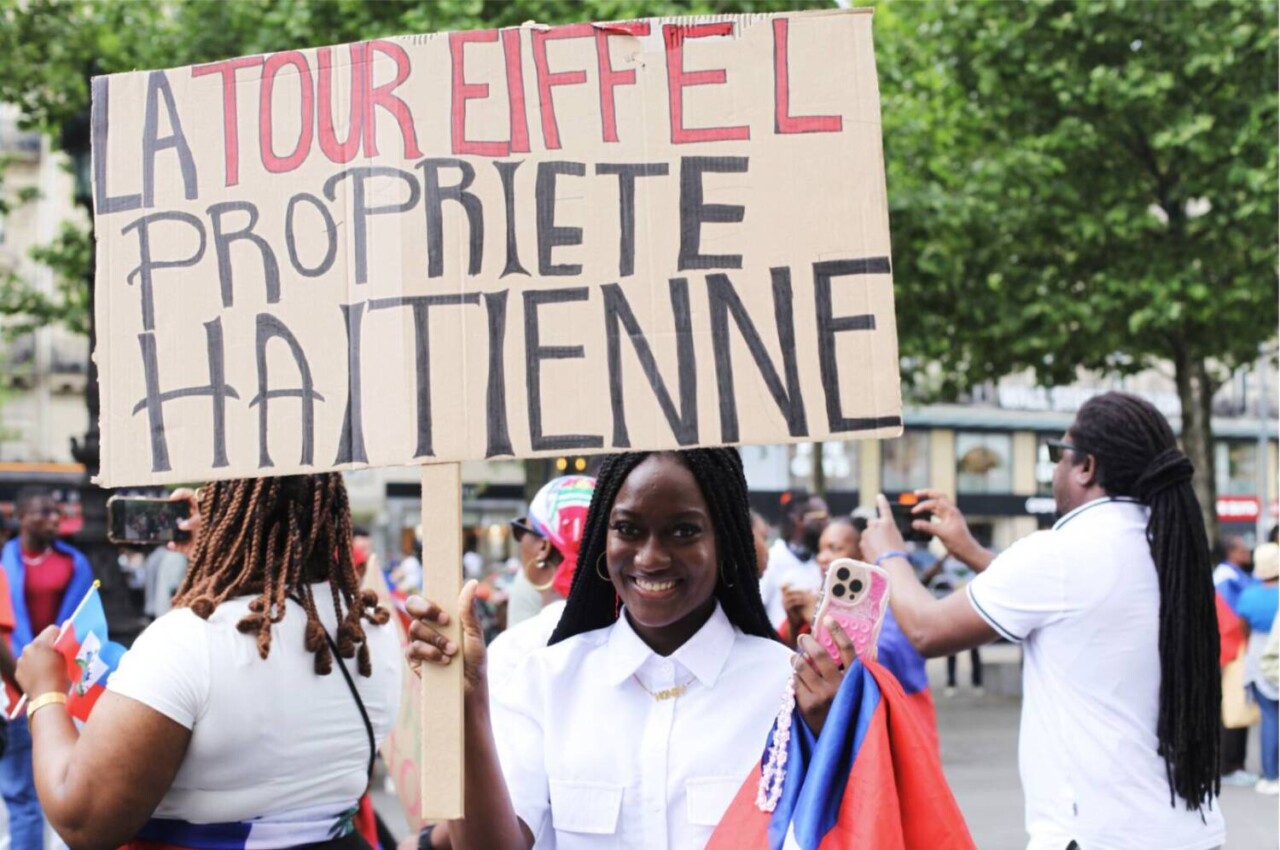 haitians-demand-reparations-the-eiffel-tower-is-haitian-property-by-daniel-perron, Haiti: Reparations Yes! Deportations No!, Featured World News & Views haitians-demand-reparations-the-eiffel-tower-is-haitian-property-by-daniel-perron, Haiti: Reparations Yes! Deportations No!, Featured World News & Views