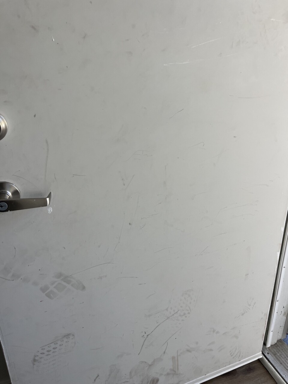 lasalle-door, Missing windows, broken locks: Hunters Point residents come home after renovations, Featured Local News & Views 