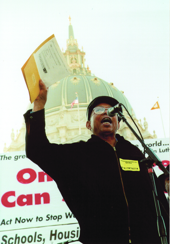 willie-ratcliff-speaks-at-021603-anti-war-rally-before-quarter-million-people, Survival requires sacrifice, Featured Local News & Views 