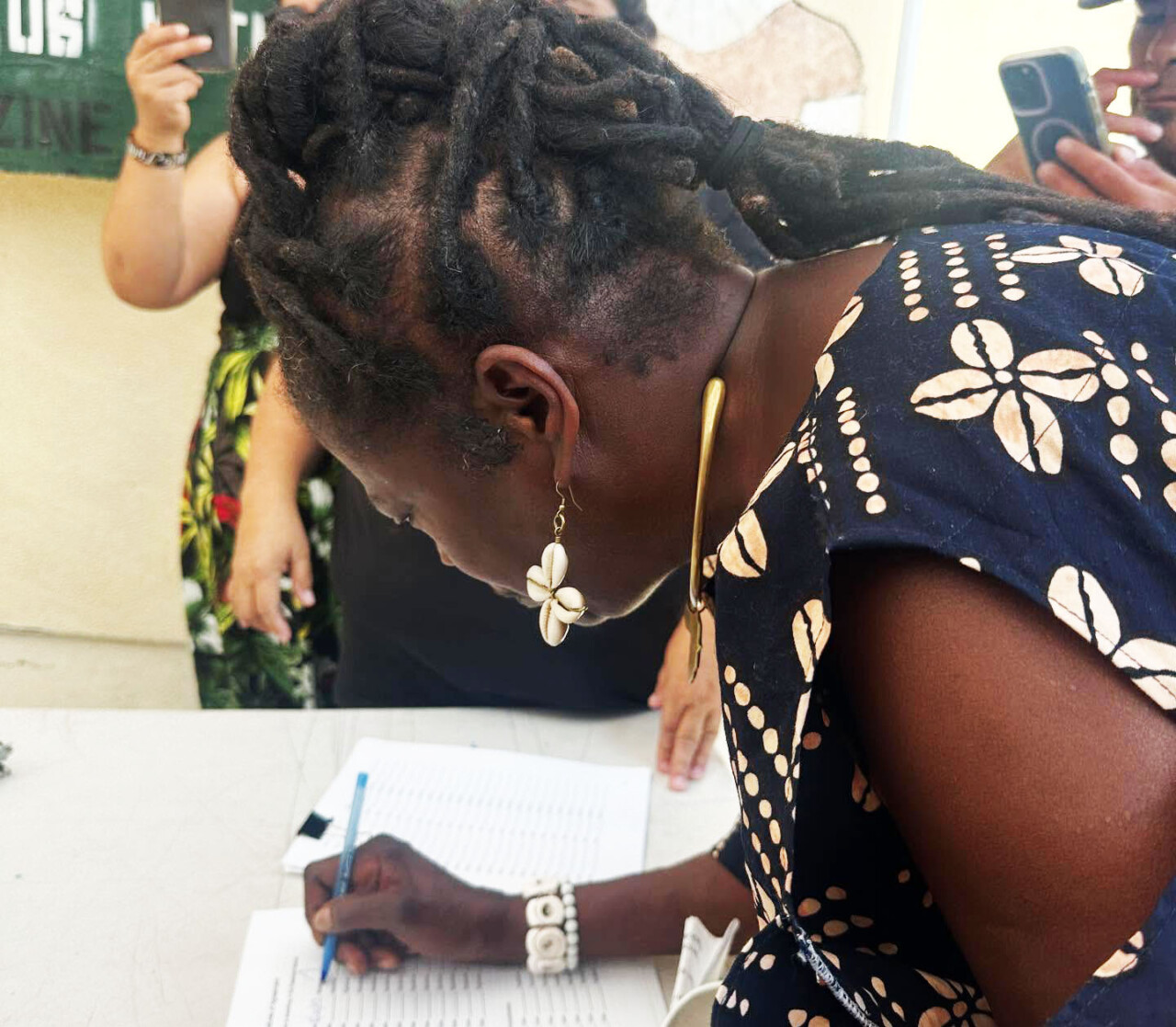 aunti-frances-moore-signs-unselling-mama-earth-document, UnSelling Mama Earth , Abolition Now! Culture Currents Event Featured Local News & Views 
