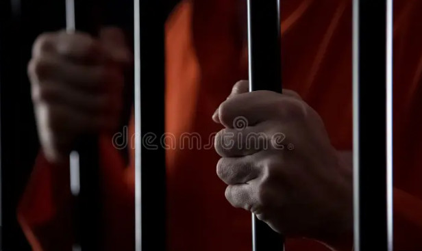 black-hands-grasping-prison-bars, CDCR's statewide lockdown condemned as a human rights crisis , Local News & Views black-hands-grasping-prison-bars, CDCR's statewide lockdown condemned as a human rights crisis , Local News & Views