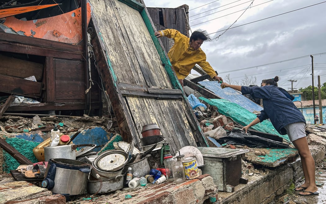 family-salvages-belongings-from-home-collapsed-by-hurricane-melissa-102925-by-yamil-lage-afp, Cuba in the clutches of Hurricane Melissa and US-imposed blockade, Featured World News & Views  family-salvages-belongings-from-home-collapsed-by-hurricane-melissa-102925-by-yamil-lage-afp, Cuba in the clutches of Hurricane Melissa and US-imposed blockade, Featured World News & Views