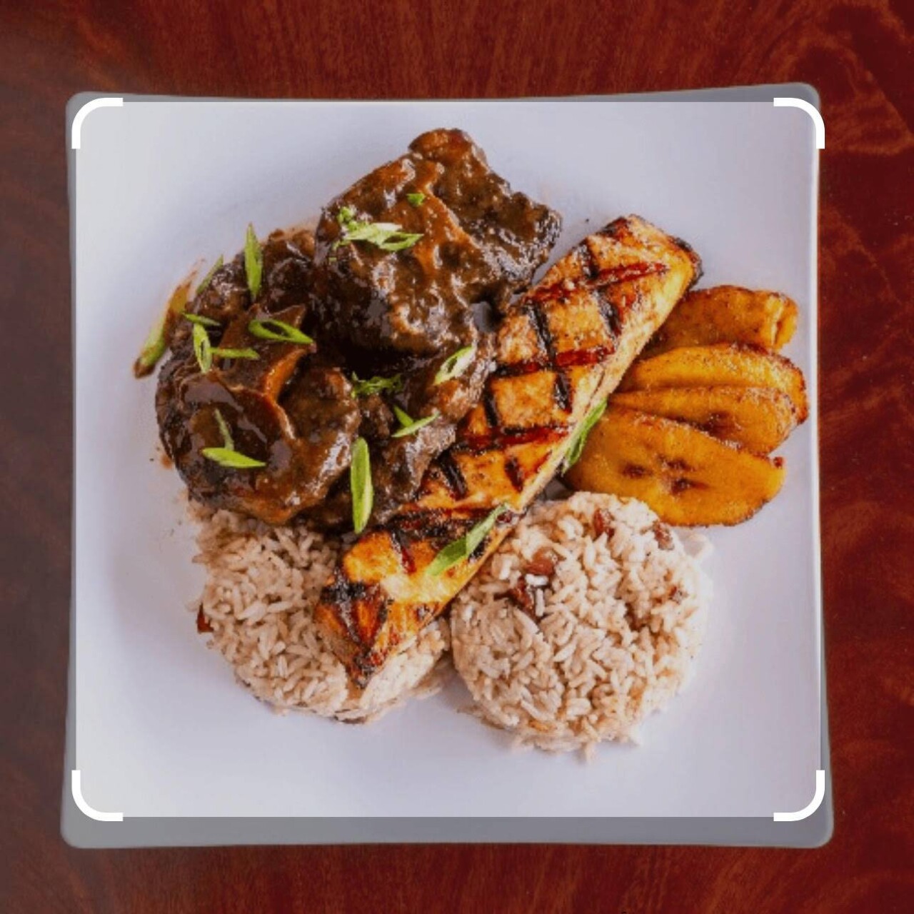 jerk-salmon-and-oxtails.-photo-courtesy-flavas-jamaican-grill, Flavas Jamaican Grill brings spice to life, Culture Currents 