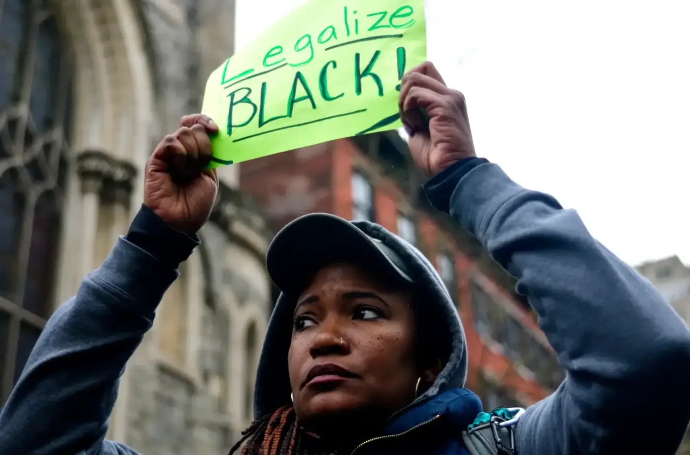 legalize-black-black-woman-holds-sign-1400x924, New analysis: Black workers face multiple barriers to workforce equity, Local News & Views 