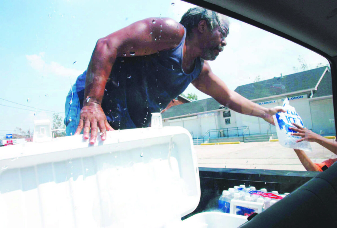 malik-rahim-distributes-life-saving-supplies-to-new-orleanians-abandoned-by-government-relief-agencies-090305, This is criminal: How Katrina was used to drive Blacks from New Orleans, Local News & Views 