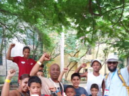 cuban-translator-tour-guide-maria-mirabel-with-mumia-freedom-tour-in-old-havana-teaching-youth-in-the-streets-about-mumia-265x198, News & Views, 