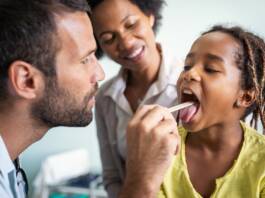 doctor-examines-a-child-photo-courtesy-of-california-black-media-265x198, News & Views, 