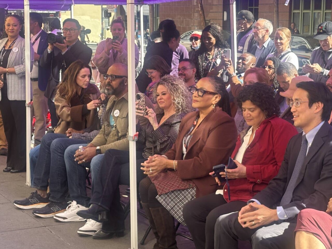 a-crowd-gathers-for-the-ribbon-cutting-ceremony.-photo-by-kevin-epps, GLIDE Opens Community Barbershop Connecting Haircuts to Health, Healing and Hope, Featured Local News & Views a-crowd-gathers-for-the-ribbon-cutting-ceremony.-photo-by-kevin-epps, GLIDE Opens Community Barbershop Connecting Haircuts to Health, Healing and Hope, Featured Local News & Views